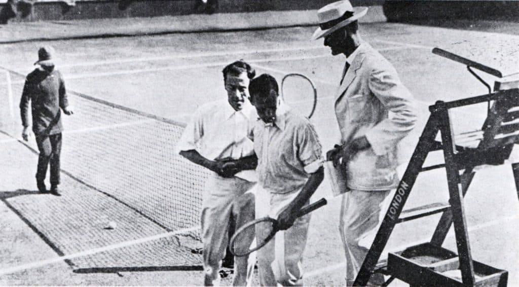 Champion Norman Brookes (Australia) shakes hands with the defeated former reigning champion Anthony Wilding (New Zealand), 1914 Wimbledon Gentlemen's Singles Final
