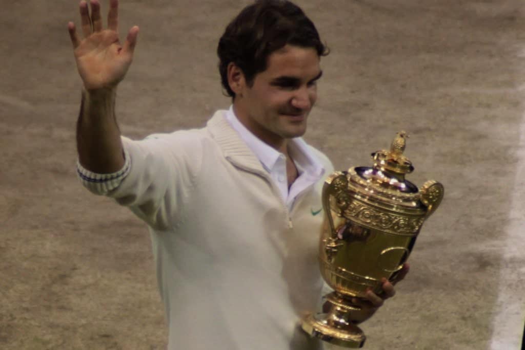 Roger Federer with the Men's Singles trophy at Wimbledon, 2012