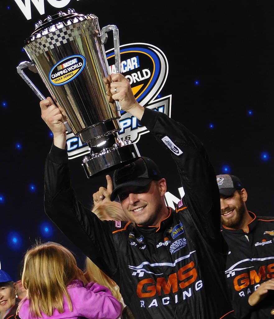 Johnny Sauter celebrates after winning the 2016 NASCAR Camping World Truck Series championship at Homestead–Miami Speedway.