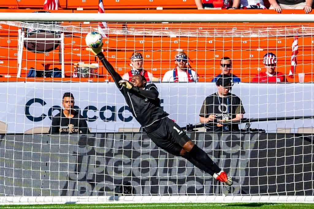 Goalkeeper Akel Clarke makes a save for Guyana in the match versus Panama at the 2019 CONCACAF Gold Cup
