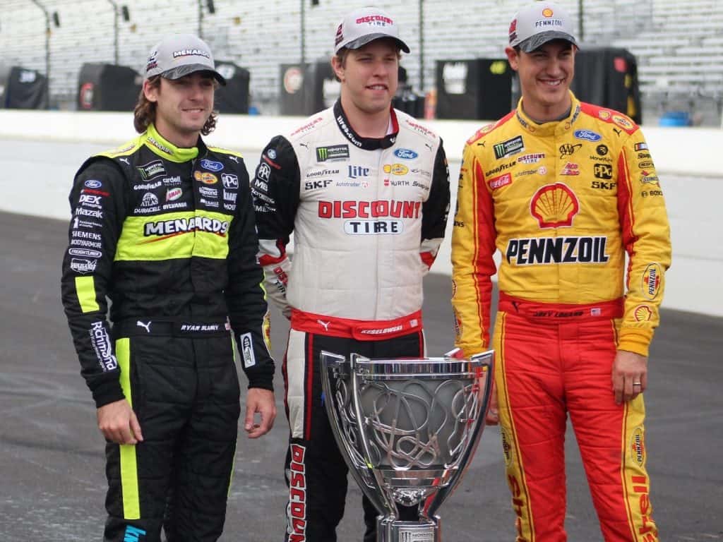 Team Penske drivers Ryan Blaney, Brad Keselowski and Joey Logano pose for a photoshoot after making the Monster Energy NASCAR Cup Series Playoffs at Indianapolis Motor Speedway in 2019.
