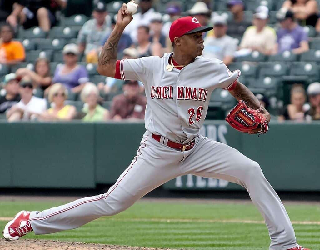Cincinnati Reds player Raisel Iglesias pitching during a game in 2017