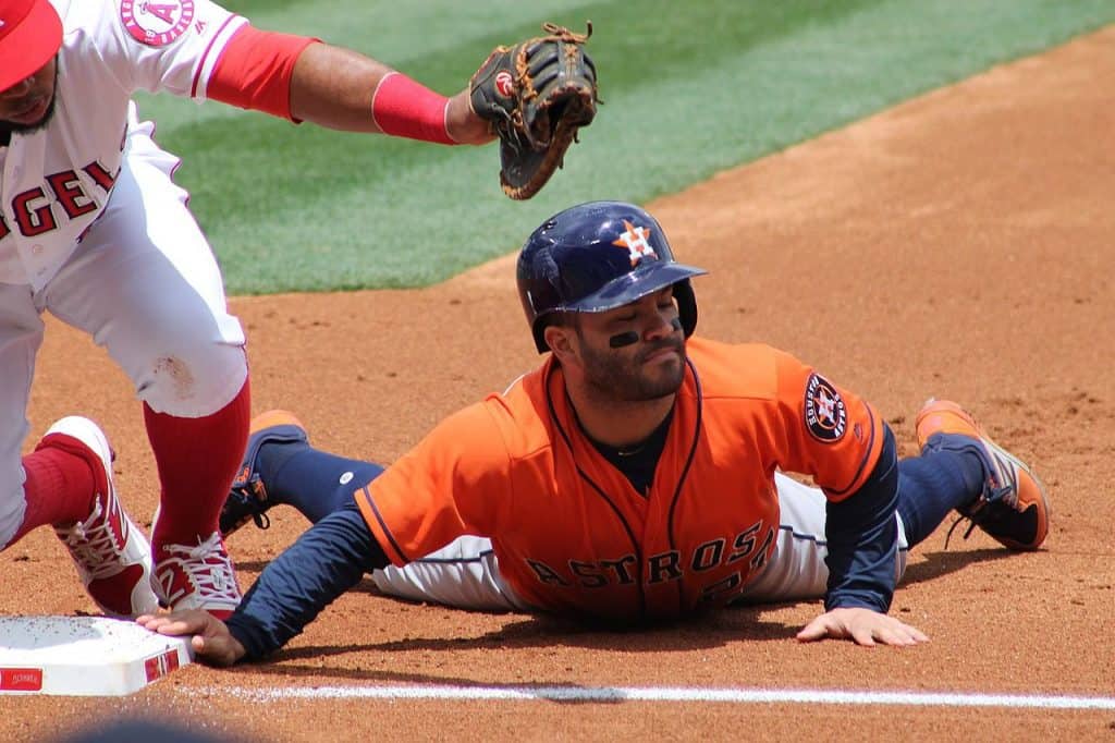 Houston Astros' José Altuve is picked off by first baseman Luis Valbuena during a May 2017 game in Anaheim