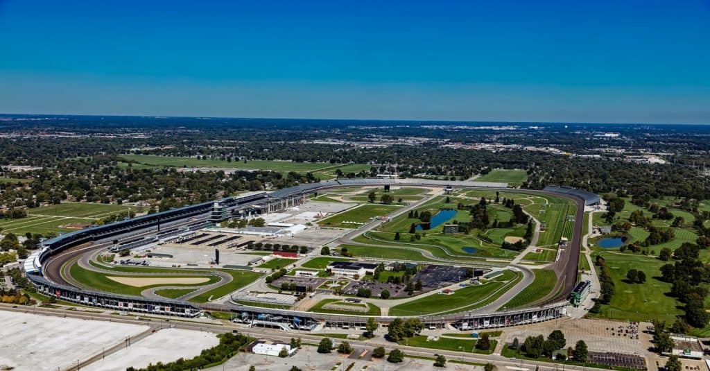 Aerial of Indianapolis Motor Speedway complex looking north. West 16th Street is in the foreground.