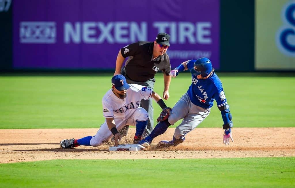 Josh Donaldson slides into second base during the first game of the 2016 ALDS - Toronto Blue Jays vs Texas Rangers