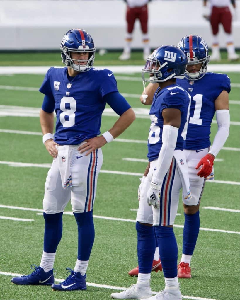 New York Giants #8 Daniel Jones (QB), #86 Darius Slayton (WR), and #81 Austin Mack (WR) on the field - Washington Commanders @ Giants - October 18, 2020