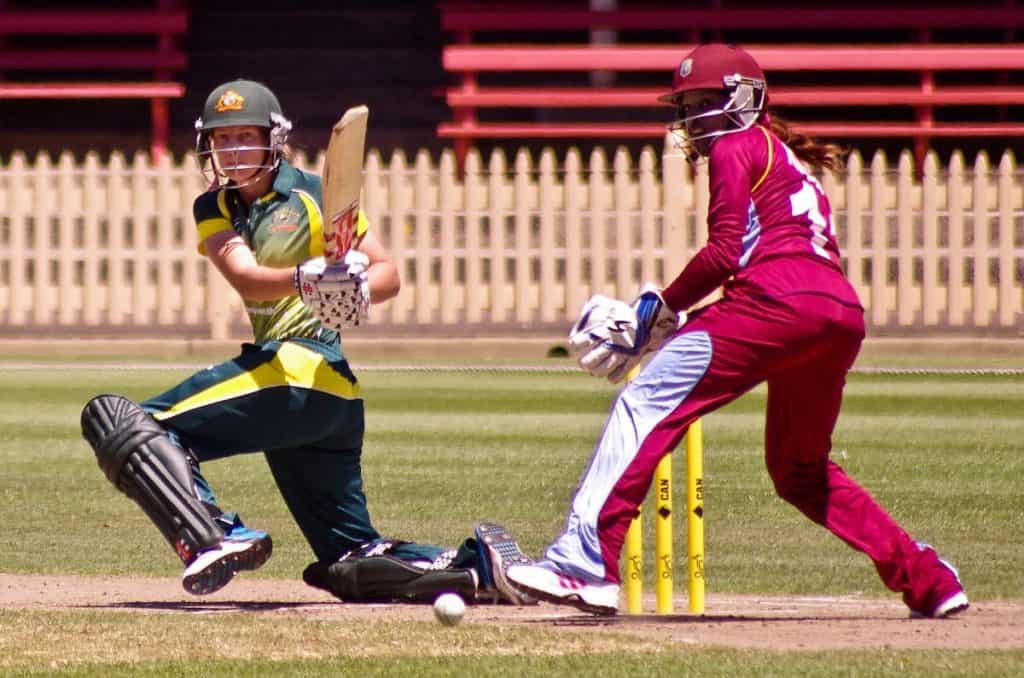 Meg Lanning of Australia plays a sweep shot, during an ODI in 2014. The wicket-keeper is Merissa Aguilleira.