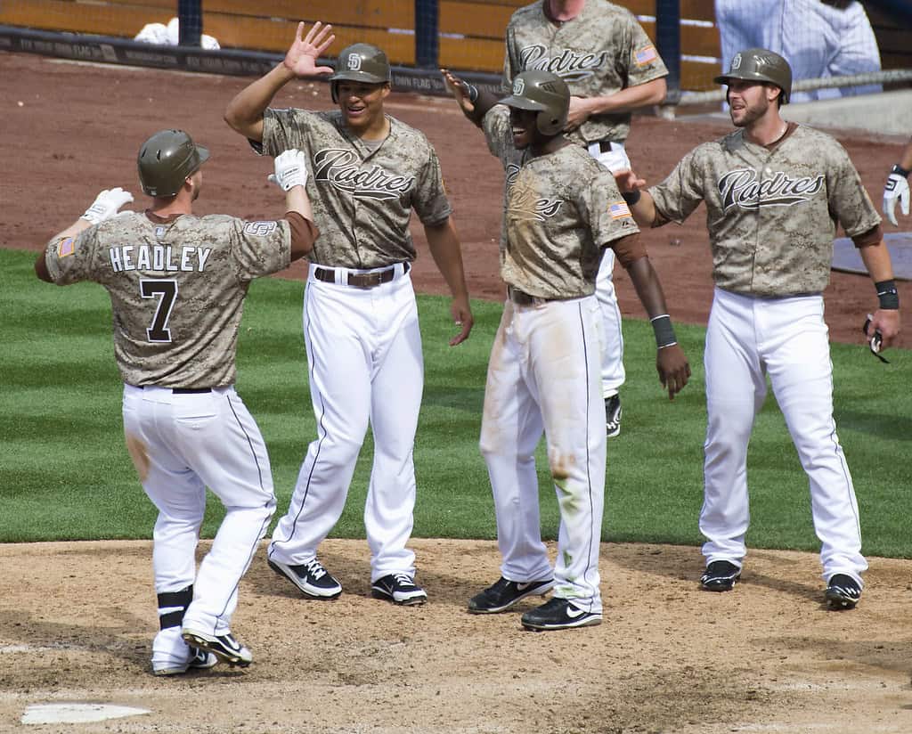 The San Diego Padres greet team member Chase Headley after a grand slam