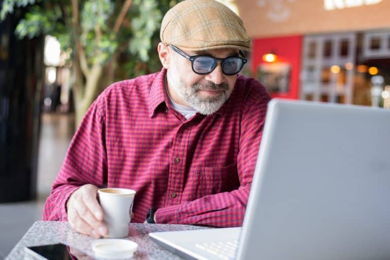 Senior using Laptop